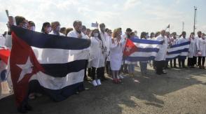 Proteccion contra el coronavirus,llegada a la patria de la Brigada Henry Reeve que colaboro en Peru. Foto: Ismael Batista Ramírez